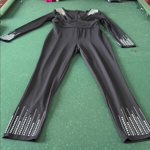 Chic Black Jumpsuit with Silver Accents